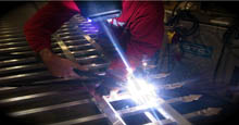 Aluminum Gates Being Welded Together To The Size Of Customers Request