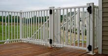 White Encore Walkway Gate Installed On Decking