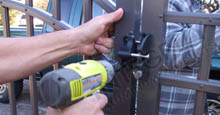 Aluminum Gate Latch Being Installed