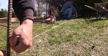 Stakes and String Create the Outline Of the Perimeter For Aluminum Fence and Gate Installation