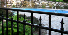 New Orleans Aluminum Pool Fencing With Historic Fleur de Lis Finials